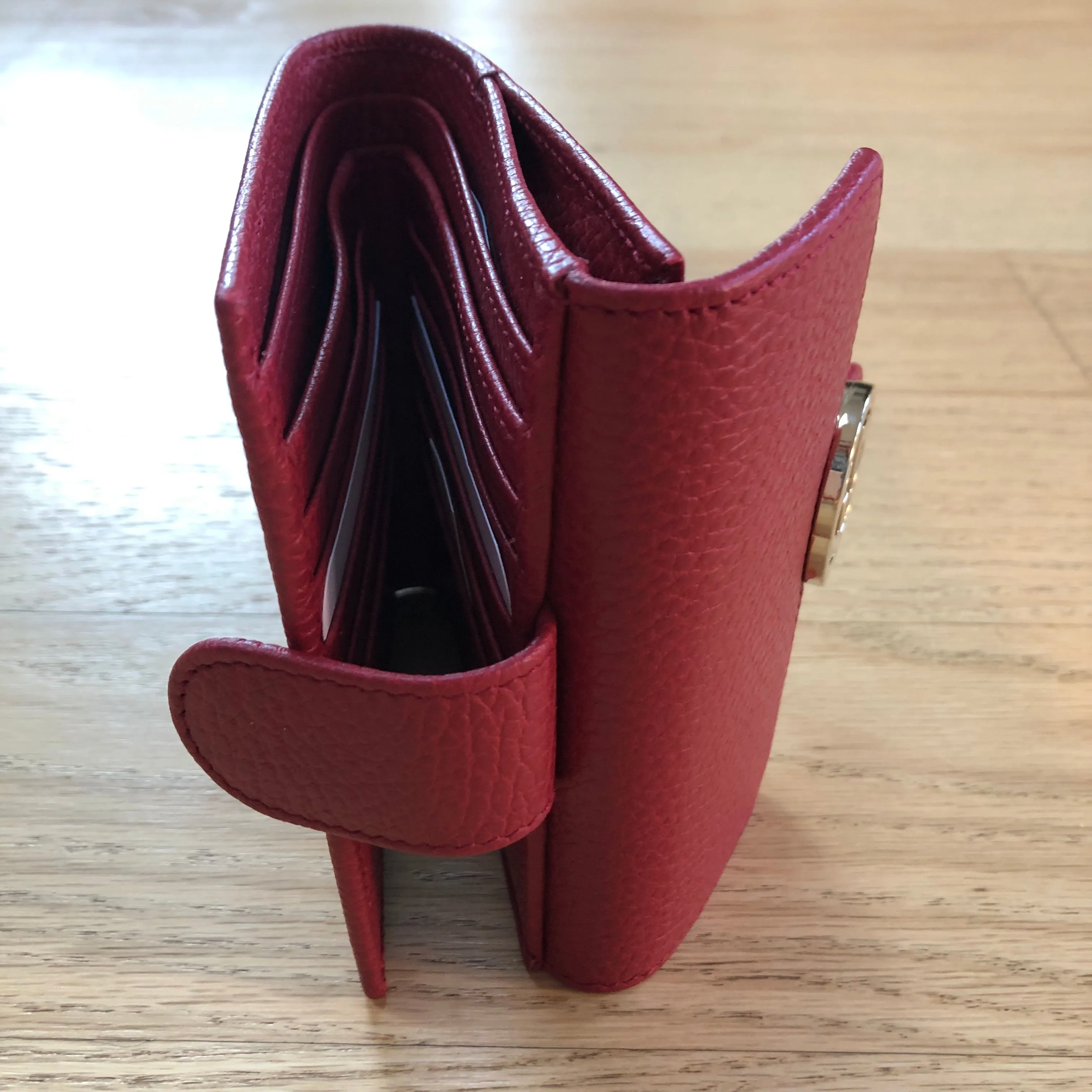 Gucci Interlocking GG French Wallet in Red